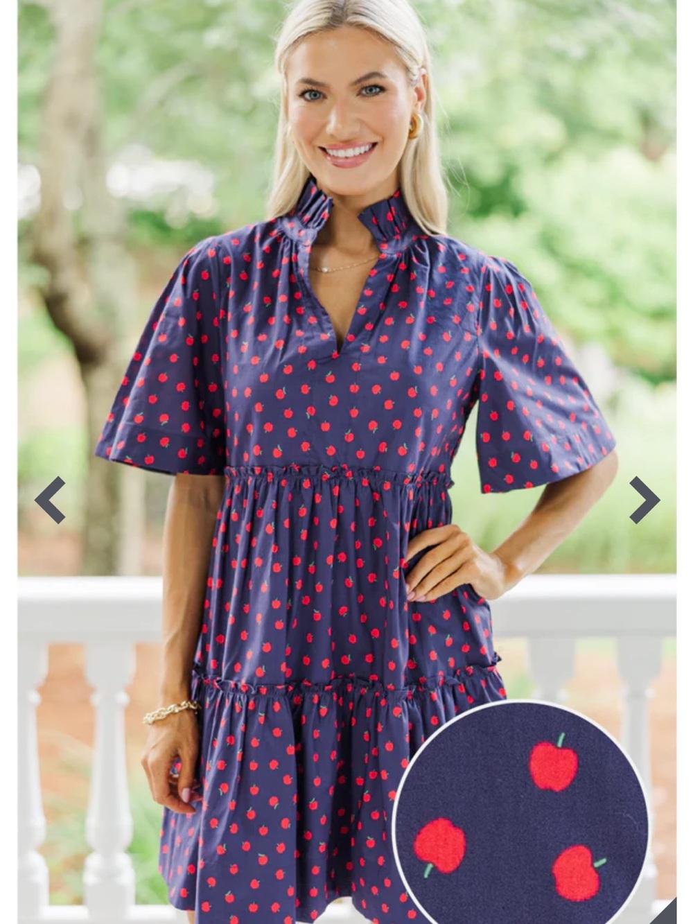 Shop the Mint navy blue apple print babydoll dress with a Ruffled High Neckline